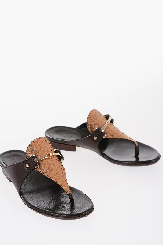 Flats with an oversized buckle for a bold statementStylish flats for every occasionGucci Python Leather Thong Flats With Buckle Embellishment