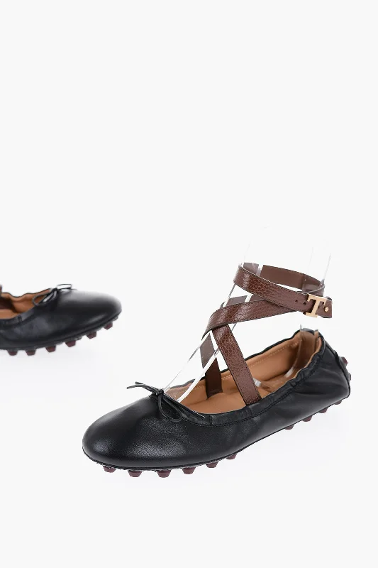 Flats with cut-out designs for added ventilationComfortable flats for relaxed, casual wearTod's Leather Lace-Up Ballet Flats With Grommets On The Sole