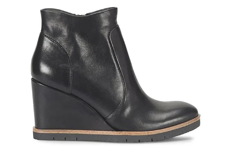 Fashionable boots with high-shine finishes for a glossy appearanceMaguire