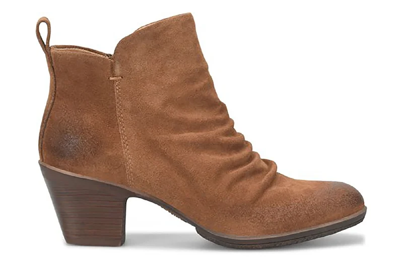 Boots with bold, stylish accents for a fashion-forward appealBrandy